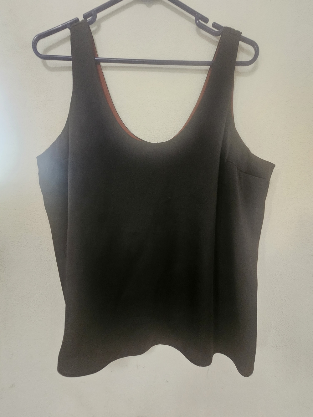 Express Reversible Satin scoop neck tank top in a rust-orange and black colorway